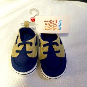 Baby boy shoes 3 to 6 months blue and khaki colored.